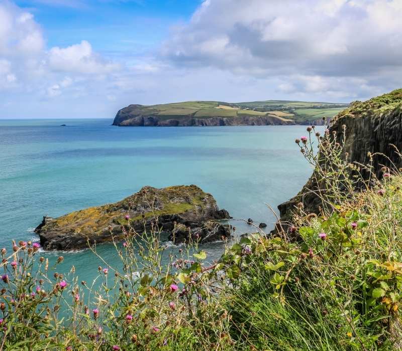 Beautiful coastal landscape with rocky cliffs and sea in British isles