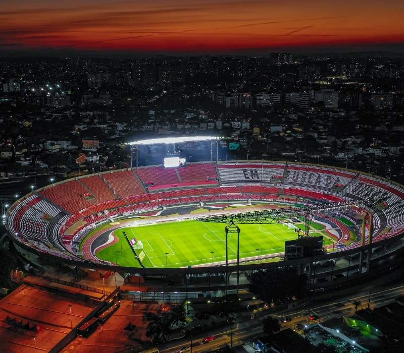 Scenic view of a football stadium and surrounding city landscape