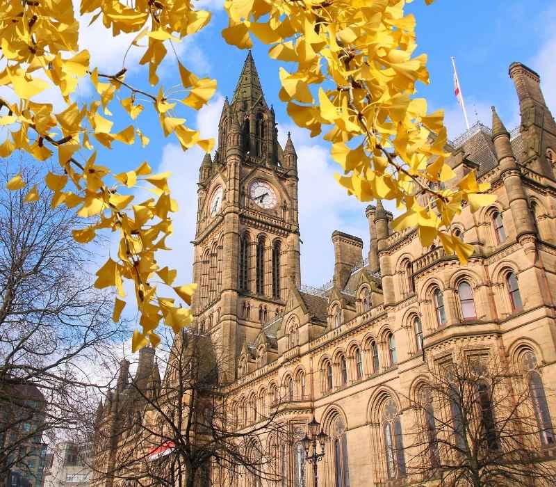 Manchester Town Hall clock tower in Albert Square, Manchester, UK